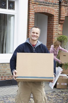 Commercial moving team preparing office equipment