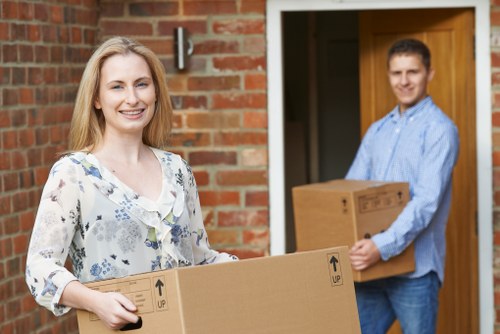 Manandvan Merton moving team handling furniture